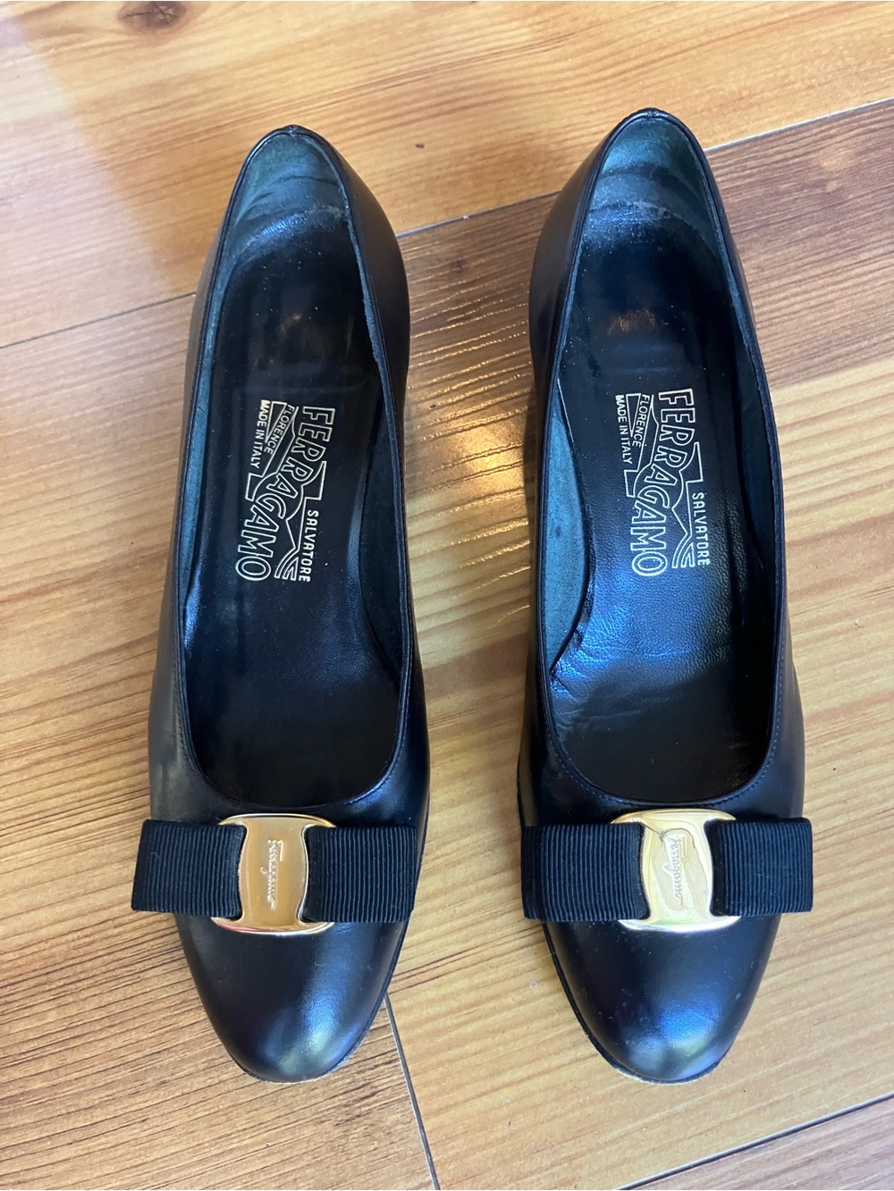 Salvatore Ferragamo Black Leather Bow Pumps with Gold Accent